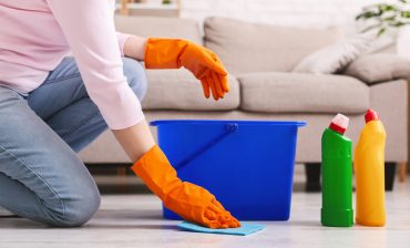 Woman,With,Obsessive,Compulsive,Disorder,Cleaning,Floor,With,Detergents,At